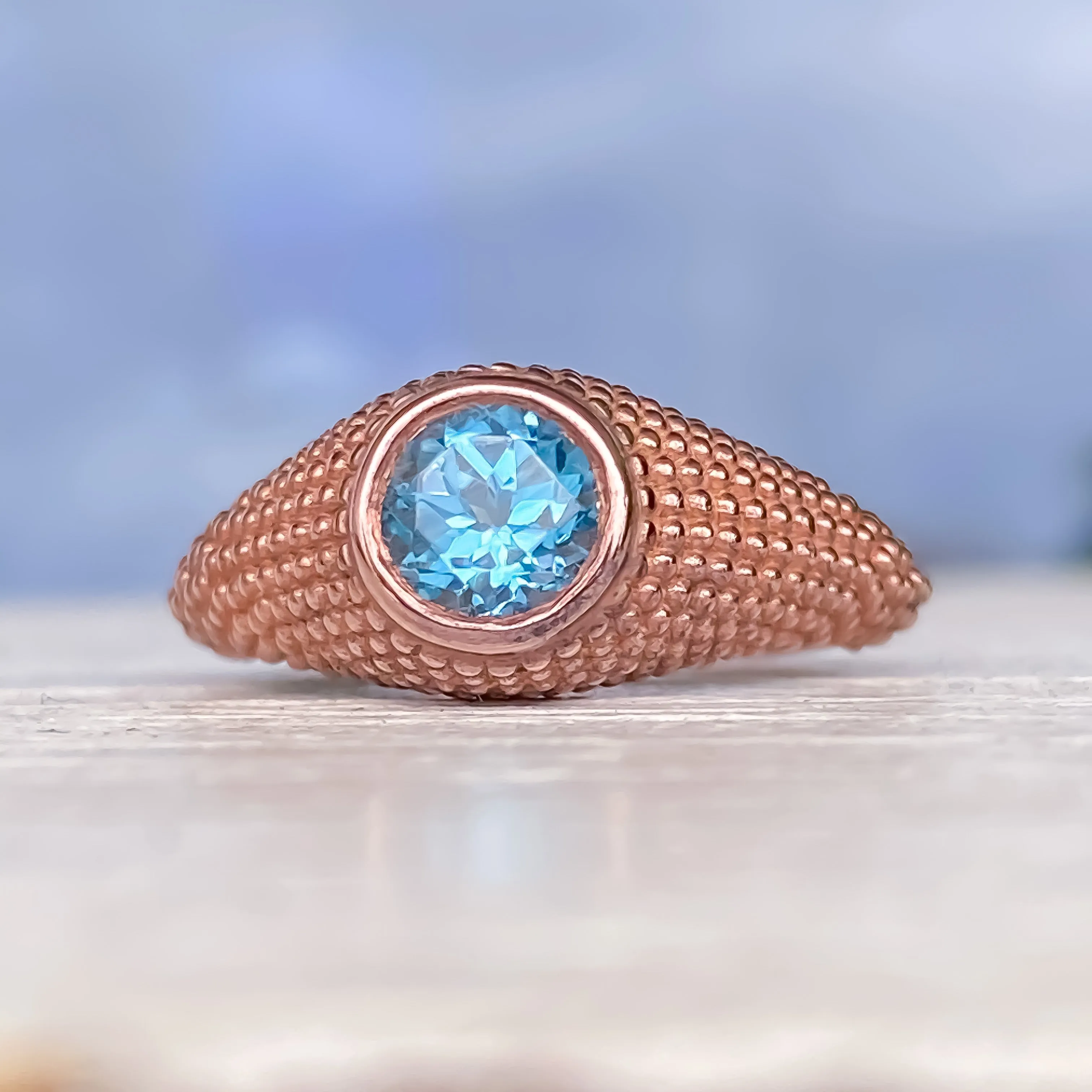 Nubia Round Blue Topaz Rose Gold Ring Size 7US