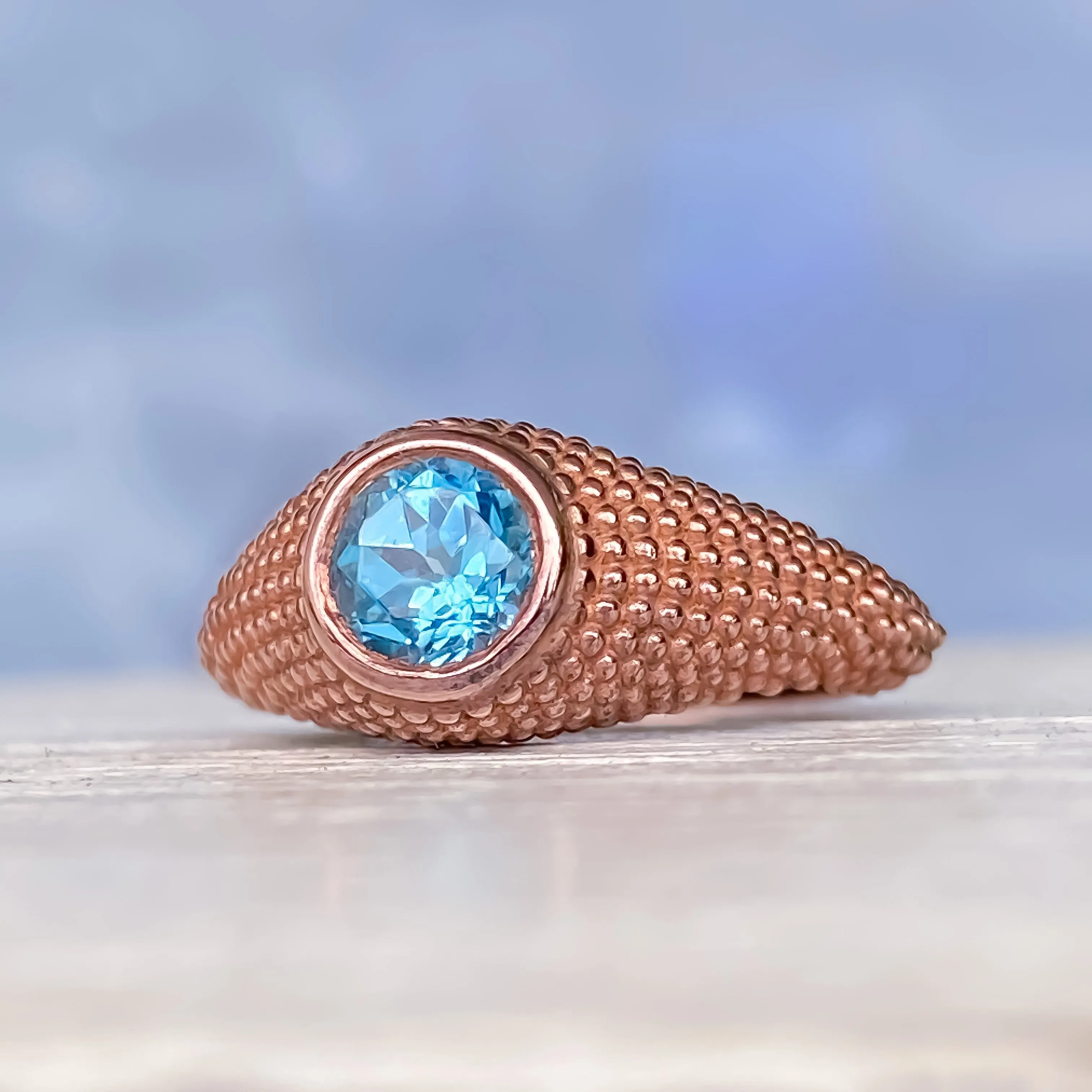 Nubia Round Blue Topaz Rose Gold Ring Size 7US