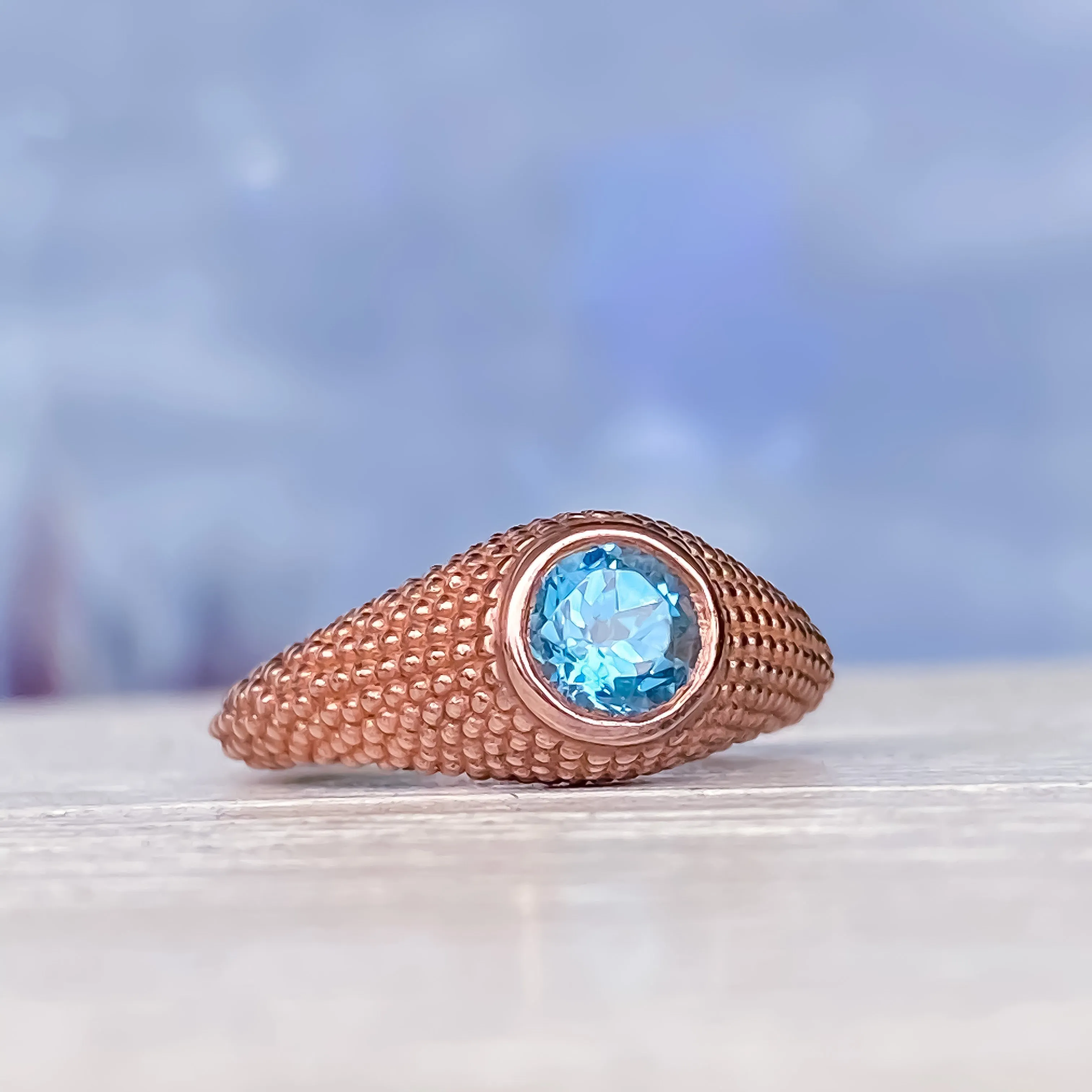 Nubia Round Blue Topaz Rose Gold Ring Size 7US